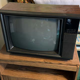 Vintage RCA XL-100 CRT television on wood media cabinet - thumbnail 2 of 6