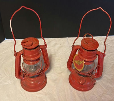 Pair of red vintage Winged Wheel lanterns - Image 1 of 7