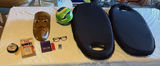 Assorted items: carved wooden mask, barometer, books, glasses, lighter, cushions, ball and circular object - thumbnail 1 of 8