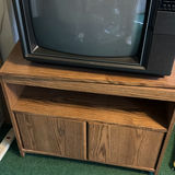 Vintage RCA XL-100 CRT television on wood media cabinet - thumbnail 3 of 6
