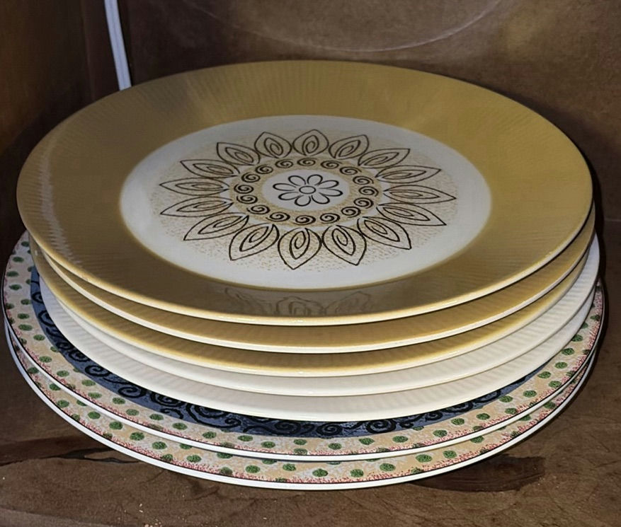 Stacked ceramic dinnerware (plates and bowls) - image 2 of 4