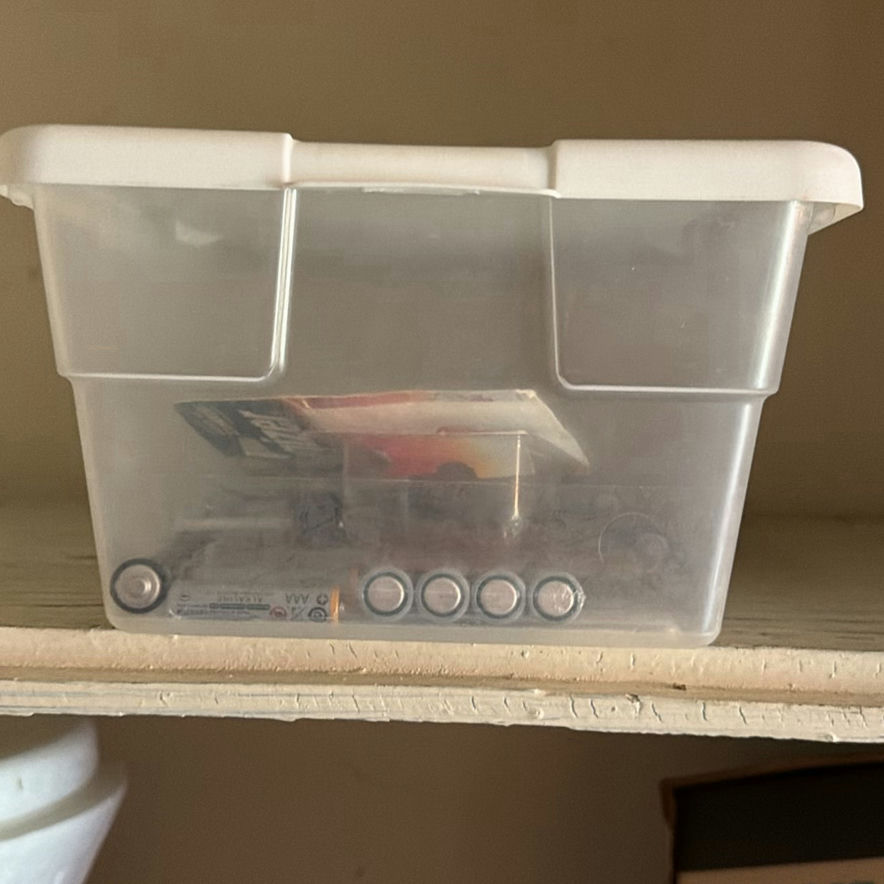 Garage shelf with cleaning products, oils, and hardware - image 8 of 8