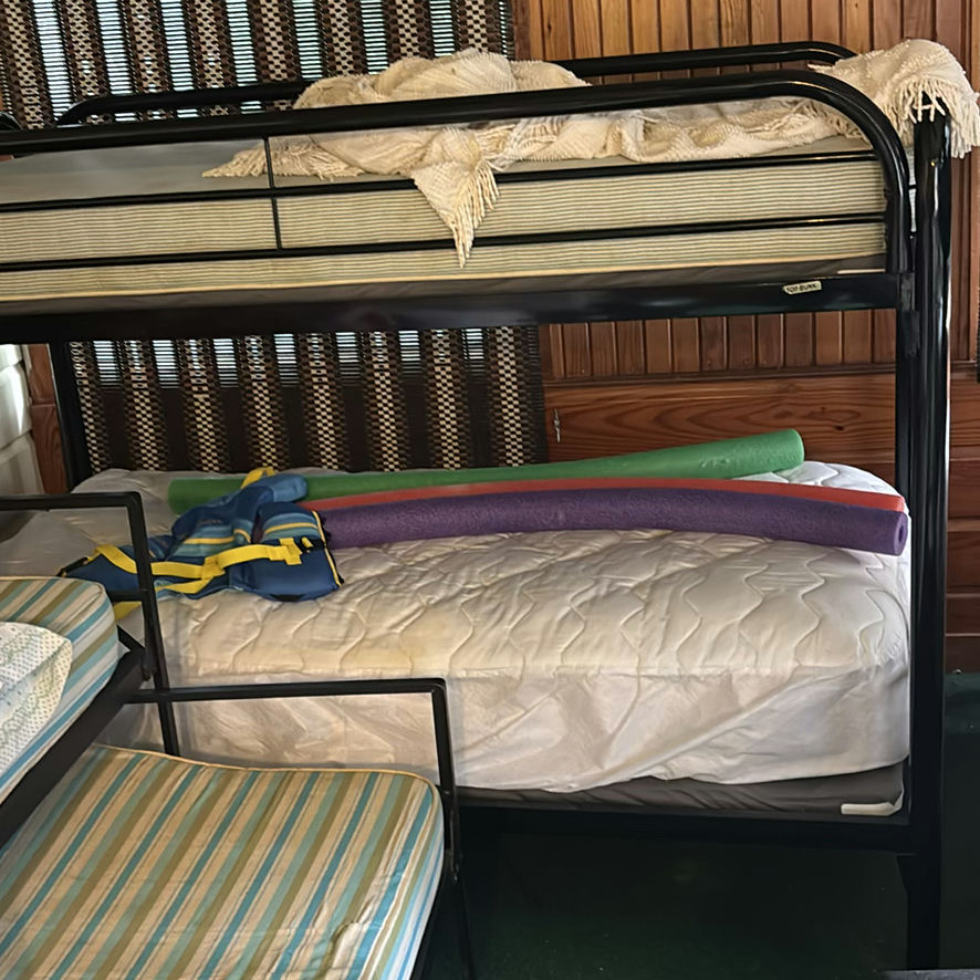 Two-tier black metal bunk beds with mattresses - image 1 of 7