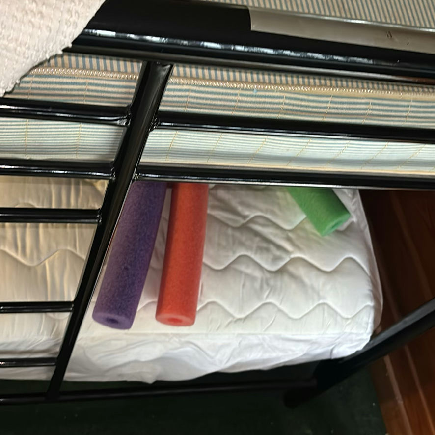 Two-tier black metal bunk beds with mattresses - image 6 of 7