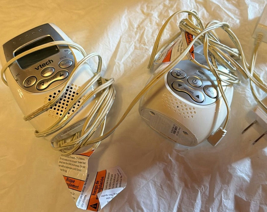 Vintage GE wood-veneer CRT television with two VTech handheld devices - image 3 of 6