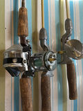Three fishing rods with reels - thumbnail 3 of 4