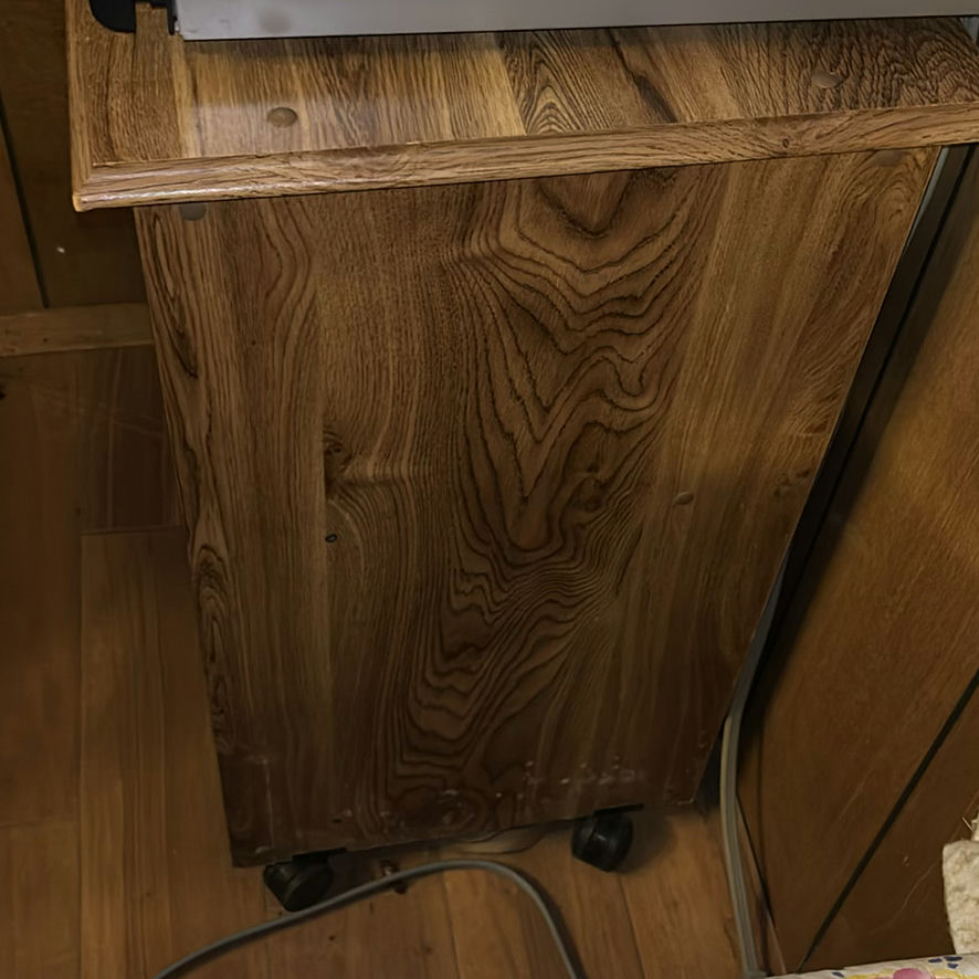 Wooden cabinet with open shelf, drawer, and electronics - image 2 of 4
