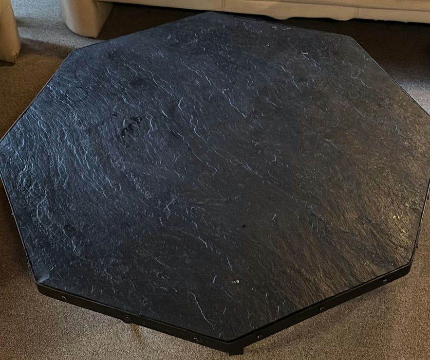 Slate-topped octagonal coffee table with wrought-iron scroll base - image 1 of 7