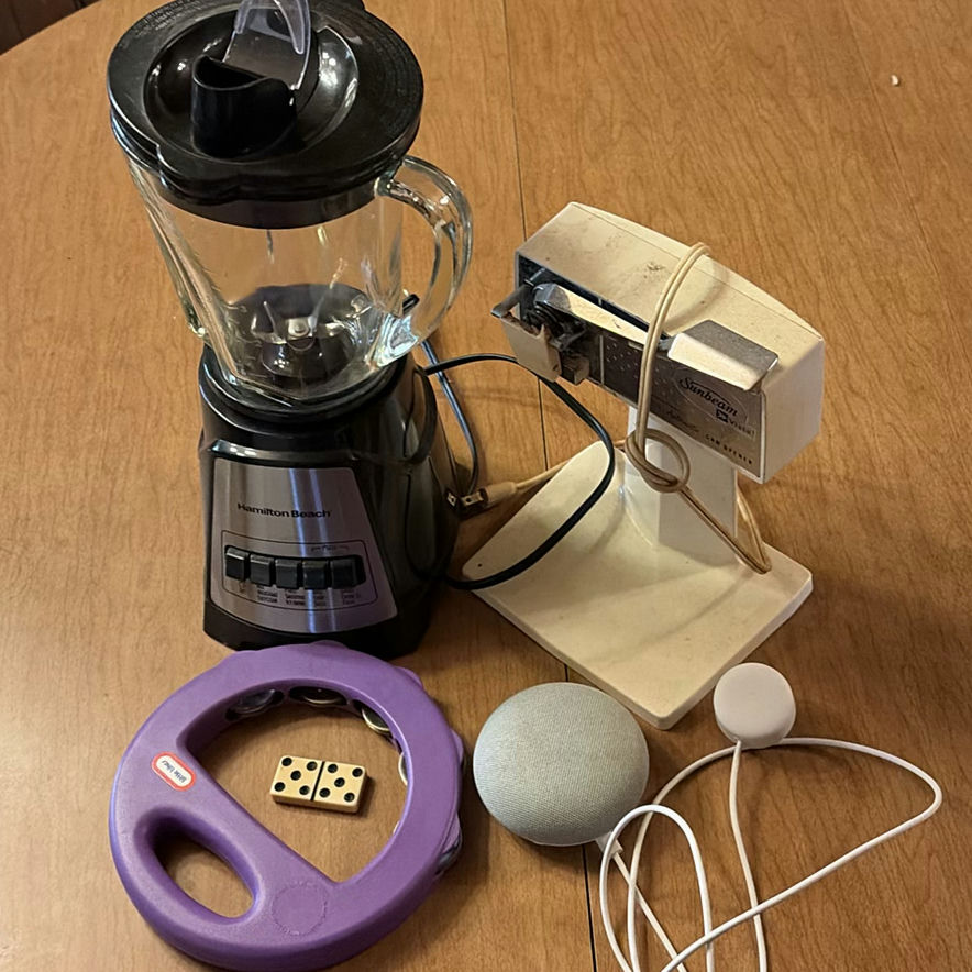 Blender, automatic can opener, purple circular device with dice, and assorted small electronics - image 1 of 7