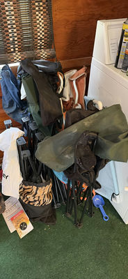 Stacked Folding Camping Chairs with Bags and Gear - Image 1 of 5