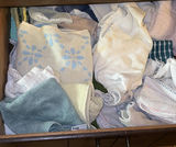 Assorted Towels and Linens in a Drawer - thumbnail 4 of 4
