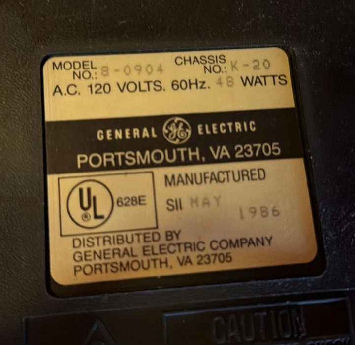 Vintage GE wood-veneer CRT television with two VTech handheld devices - image 5 of 6