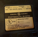 Vintage GE wood-veneer CRT television with two VTech handheld devices - thumbnail 5 of 6