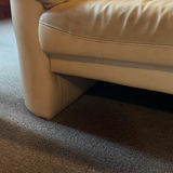 Beige leather sofa and love seat with blue and patterned throw pillows - thumbnail 4 of 7