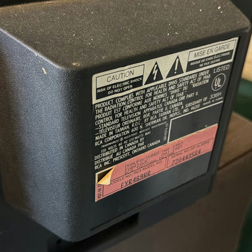 Vintage RCA XL-100 CRT television on wood media cabinet - image 5 of 6
