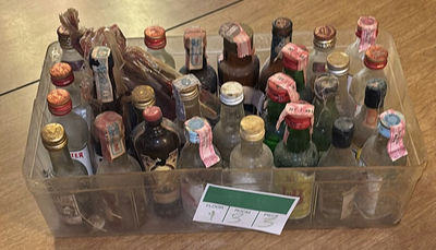 Antique assortment of miniature liquor bottles - Image 1 of 7