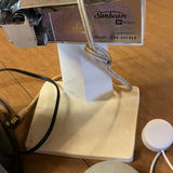 Blender, automatic can opener, purple circular device with dice, and assorted small electronics - thumbnail 6 of 7