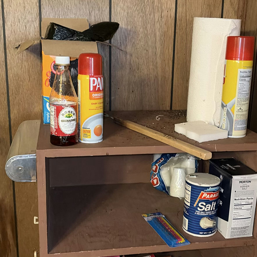 Pantry shelf with cooking supplies and snacks - image 4 of 5