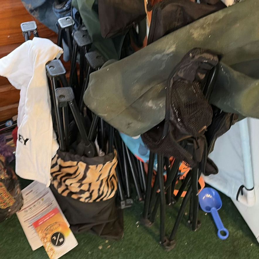 Stacked Folding Camping Chairs with Bags and Gear - image 2 of 5
