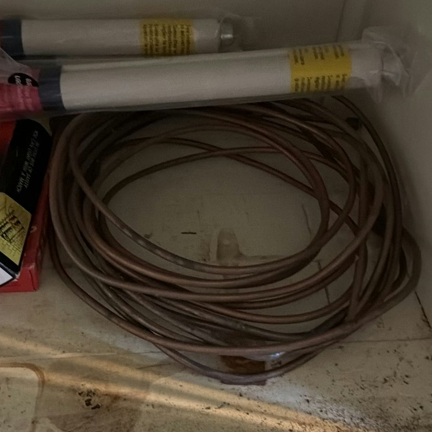 Box of plastic forks and cleaning supplies with miscellaneous household items - image 2 of 7