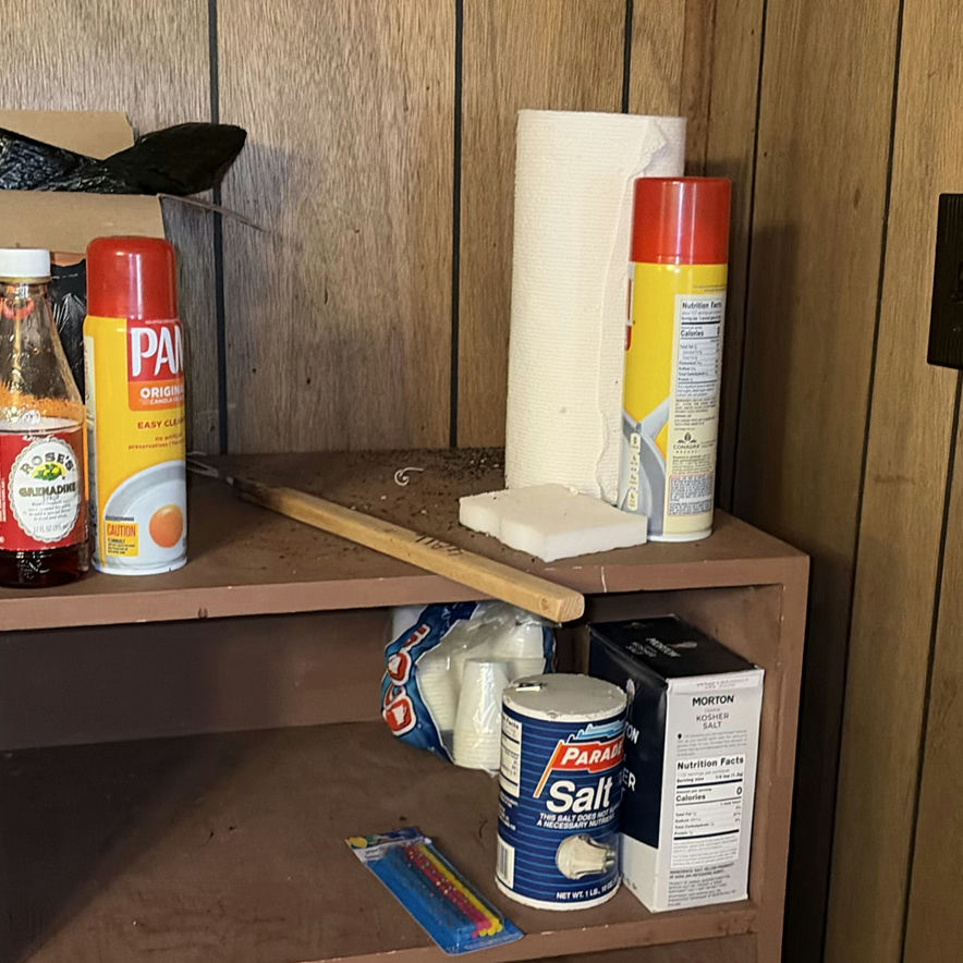 Pantry shelf with cooking supplies and snacks - image 3 of 5