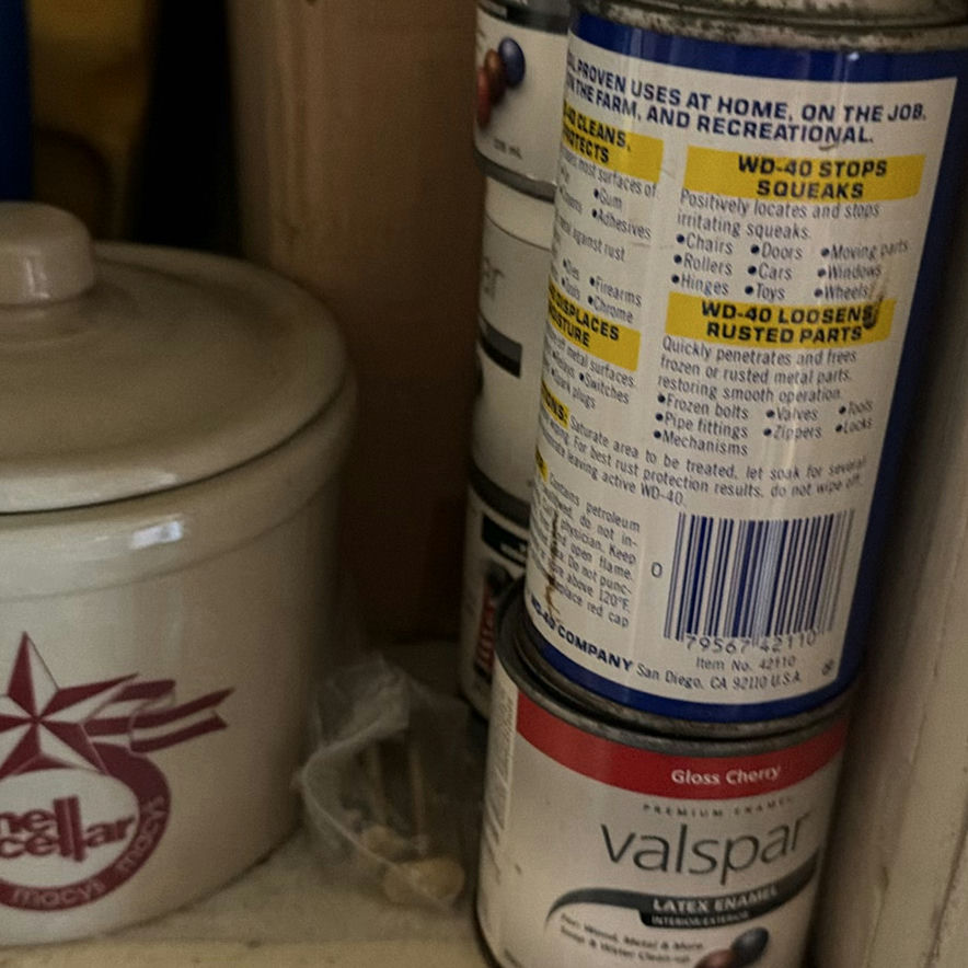 Garage shelf with cleaning products, oils, and hardware - image 5 of 8
