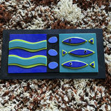 Abstract three-panel wall sculpture with wavy bands and fish motifs - thumbnail 1 of 4