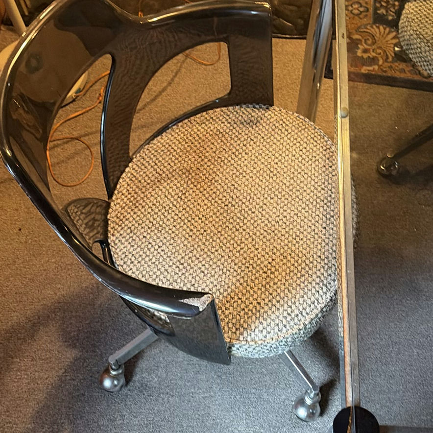 Glass-top dining table with four chrome-and-black swivel chairs - image 5 of 8