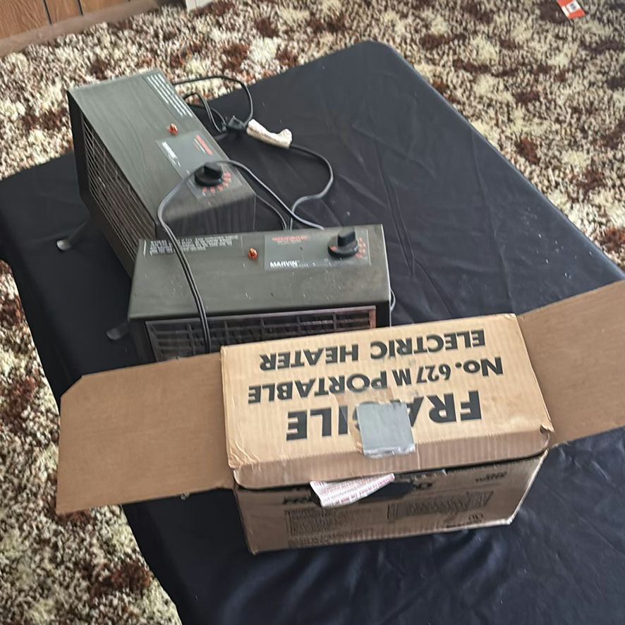 Collection of portable electric space heaters - image 8 of 11