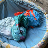 Circular Kiddie Pool with Crumpled Plastic Sheets - thumbnail 2 of 2