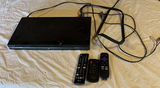 Sony DVD player with remotes and mixed DVD collection - thumbnail 1 of 6