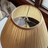 Beige ceramic table lamp with pleated shade on marble-top end table - thumbnail 5 of 5