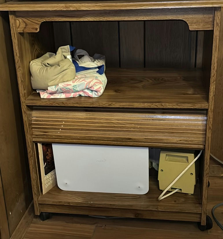 Wooden cabinet with open shelf, drawer, and electronics - image 4 of 4