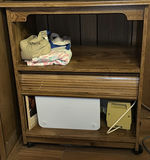 Wooden cabinet with open shelf, drawer, and electronics - thumbnail 4 of 4